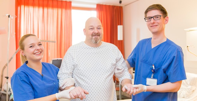 inpatient accompanied by two nurses